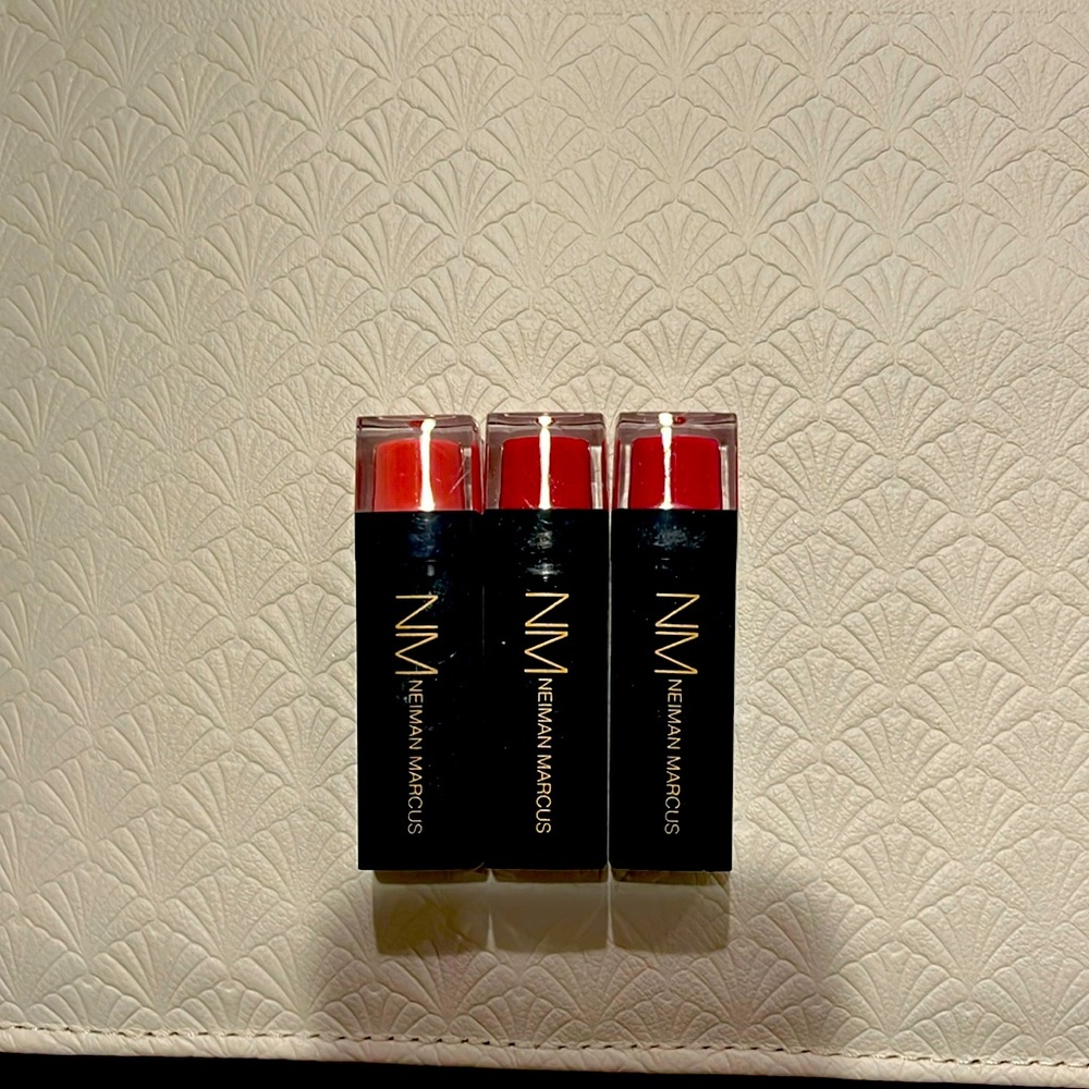 Neiman Marcus lipstick bundle. Light pink, red, and Fuchsia colors Never used!